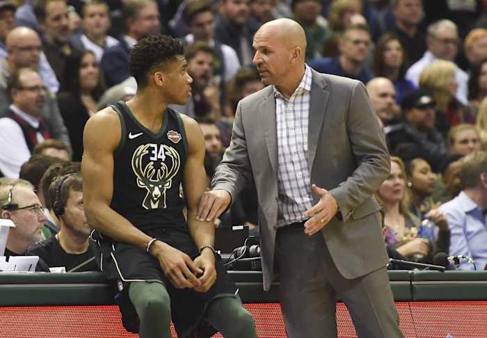 Milwaukee Bucks head coach Jason Kidd talks to forward Giannis Antetokounmpo (34